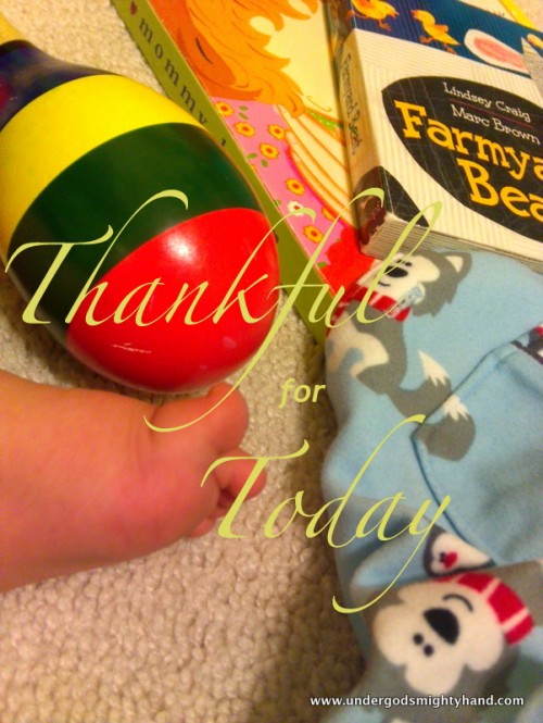 Thankful for Today - baby foot, musical instrument, books, pajamas - all part of a normal day